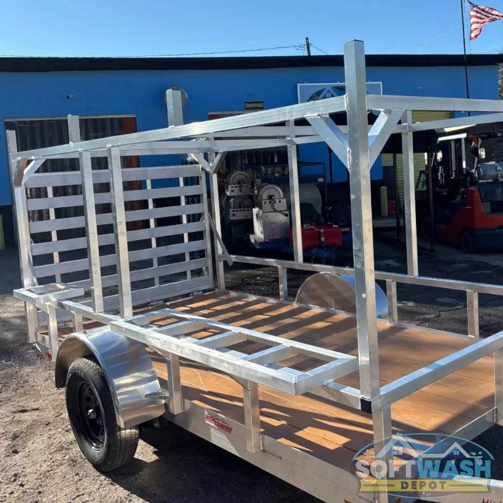 2026 Alcom 6x12 single axle aluminum trailer with rear drop-down tailgate and pressure-treated wood floor, designed for contractor and soft wash equipment setups. - Soft Wash Depot