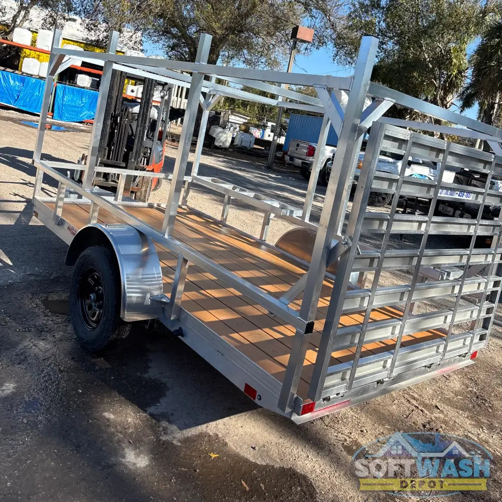 2026 Alcom 6x12 single axle aluminum trailer with rear drop-down tailgate and pressure-treated wood floor, designed for contractor and soft wash equipment setups. - Soft Wash Depot