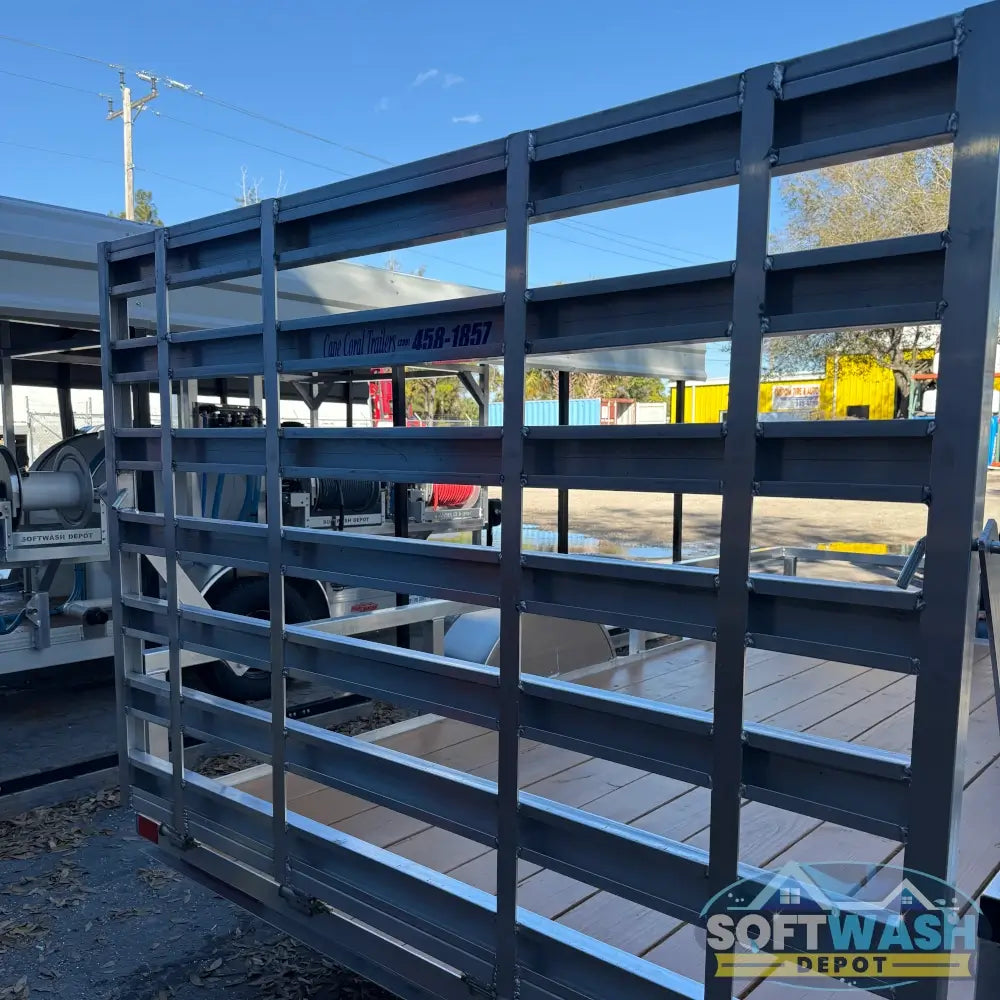 2026 Alcom 6x12 single axle aluminum trailer with rear drop-down tailgate and pressure-treated wood floor, designed for contractor and soft wash equipment setups. - Soft Wash Depot