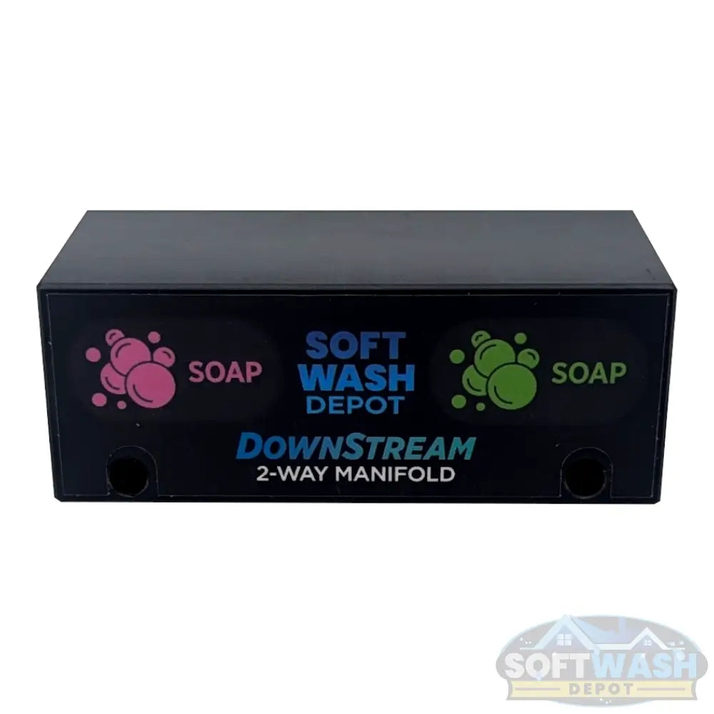 Black downstream injector manifold block available in 2-port and 3-port configurations, featuring chemical-resistant valves and barbed fittings for quick soft wash solution switching. - Soft Wash Depot
