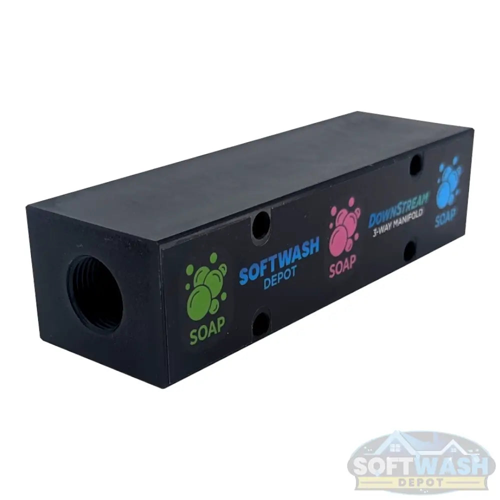 Black downstream injector manifold block available in 2-port and 3-port configurations, featuring chemical-resistant valves and barbed fittings for quick soft wash solution switching. - Soft Wash Depot