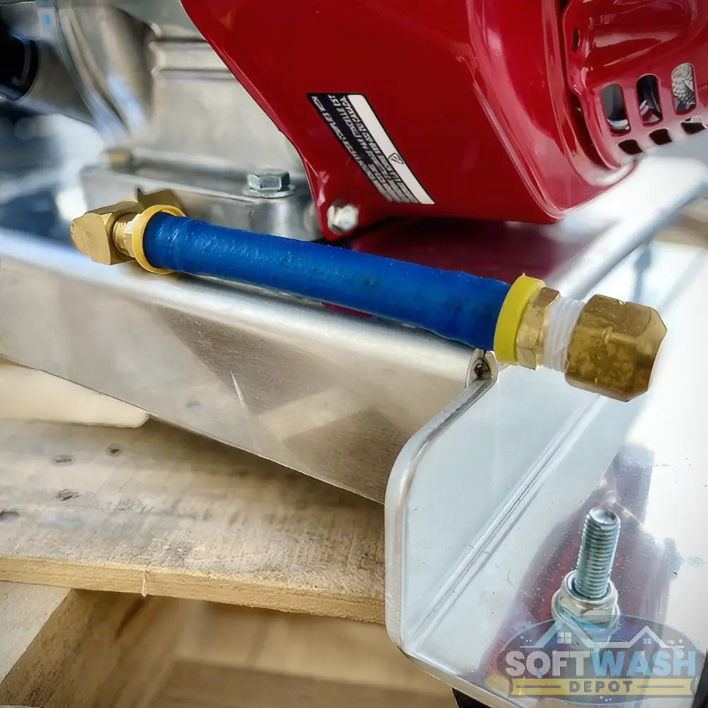 Honda engine with Comet P40 softwash pump system mounted on aluminum base, featuring battery cables and chemical-resistant components - Soft Wash Depot.