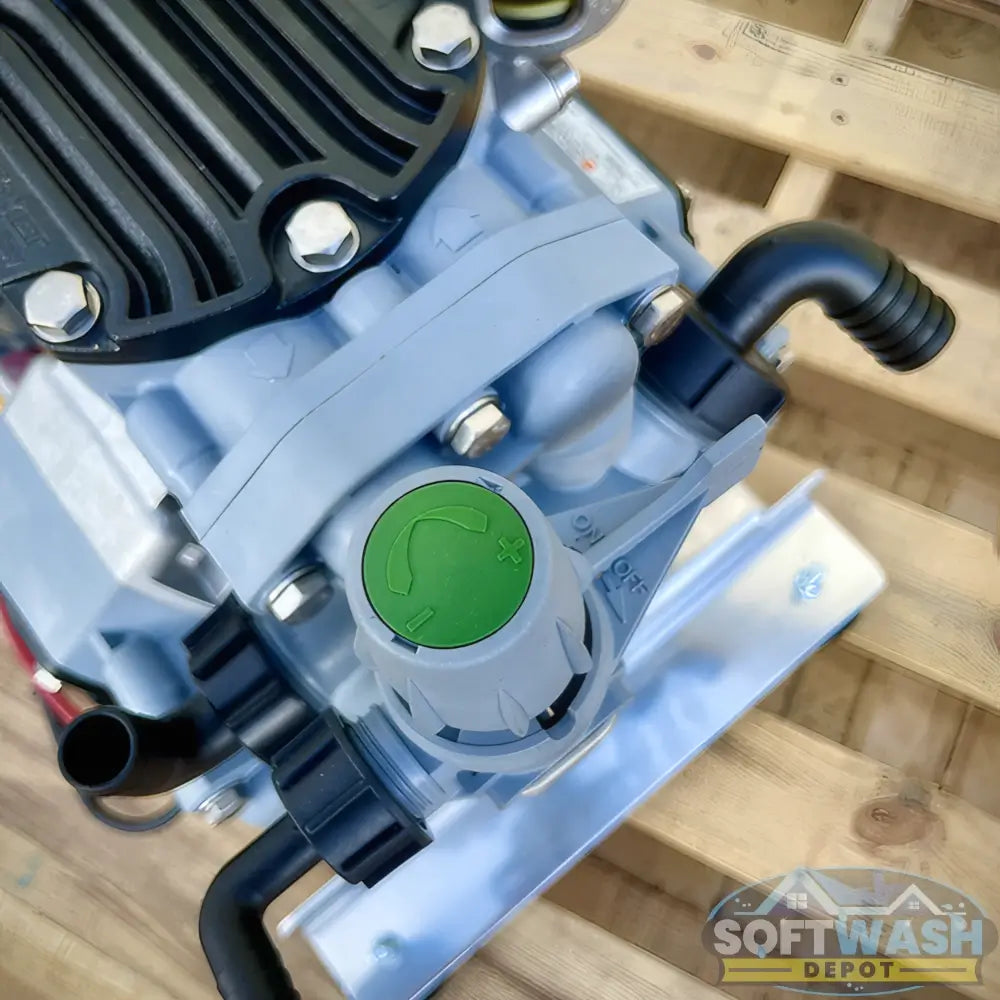 Honda engine with Comet P40 softwash pump system mounted on aluminum base, featuring battery cables and chemical-resistant components - Soft Wash Depot.