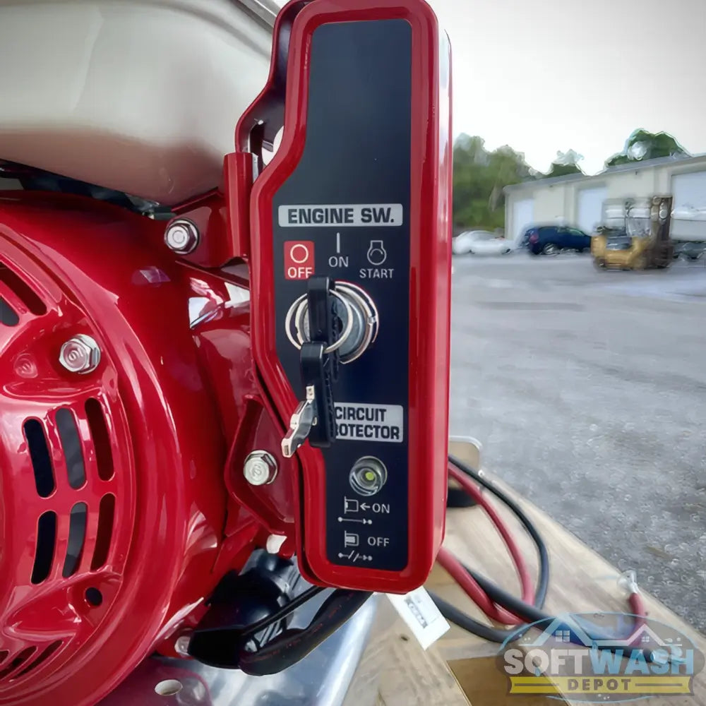 Honda engine with Comet P40 softwash pump system mounted on aluminum base, featuring battery cables and chemical-resistant components - Soft Wash Depot.