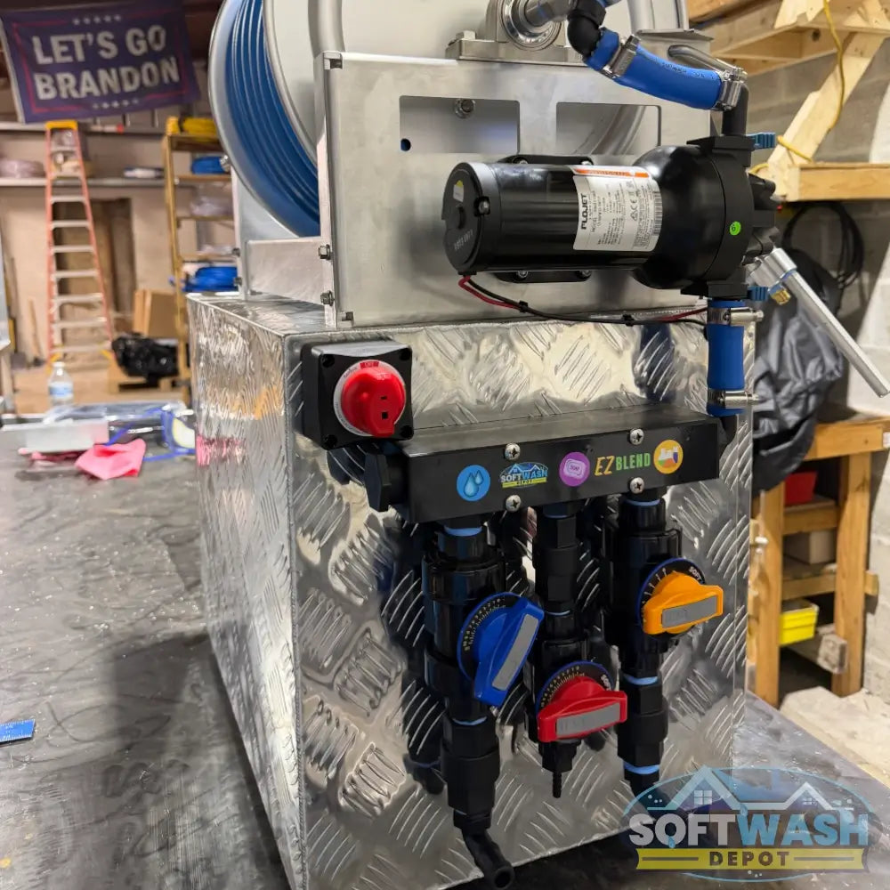 SWD Plug & Play 12V Soft Wash System with aluminum toolbox, stainless hose reel, blue soft wash hose, spray gun, EZ Blend proportioner, pump, valves, and fittings. - Soft Wash Depot