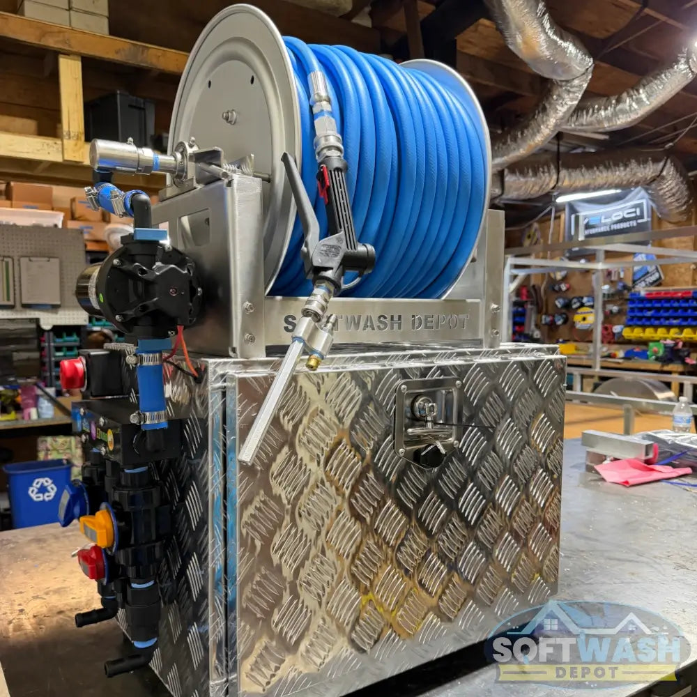 SWD Plug & Play 12V Soft Wash System with aluminum toolbox, stainless hose reel, blue soft wash hose, spray gun, EZ Blend proportioner, pump, valves, and fittings. - Soft Wash Depot