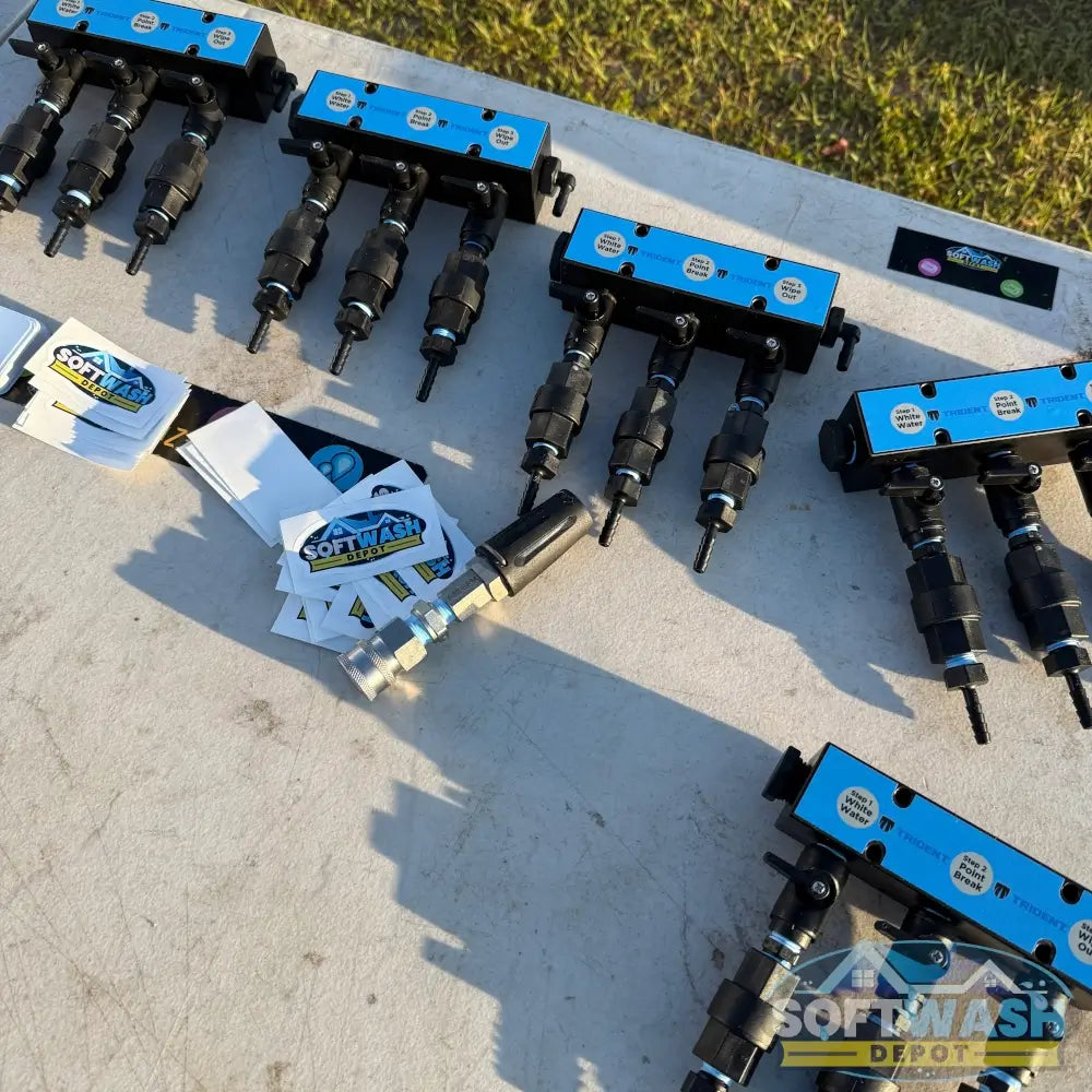 Trident downstream injector 3-port manifold with labeled chemical ports for White Water, Point Break, and Wipe Out solutions, designed for fast switching and efficient soft wash mixing. - Soft Wash Depot