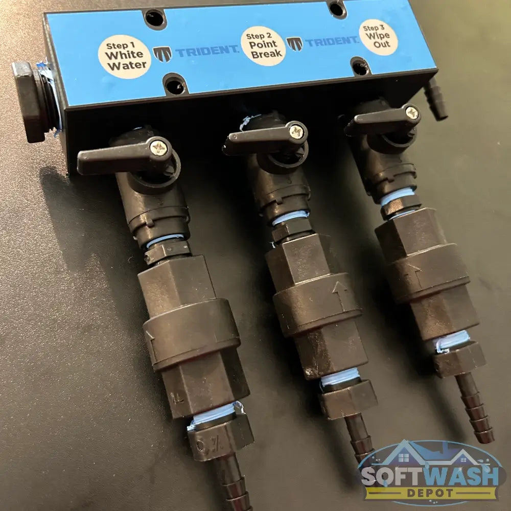 Trident downstream injector 3-port manifold with labeled chemical ports for White Water, Point Break, and Wipe Out solutions, designed for fast switching and efficient soft wash mixing. - Soft Wash Depot