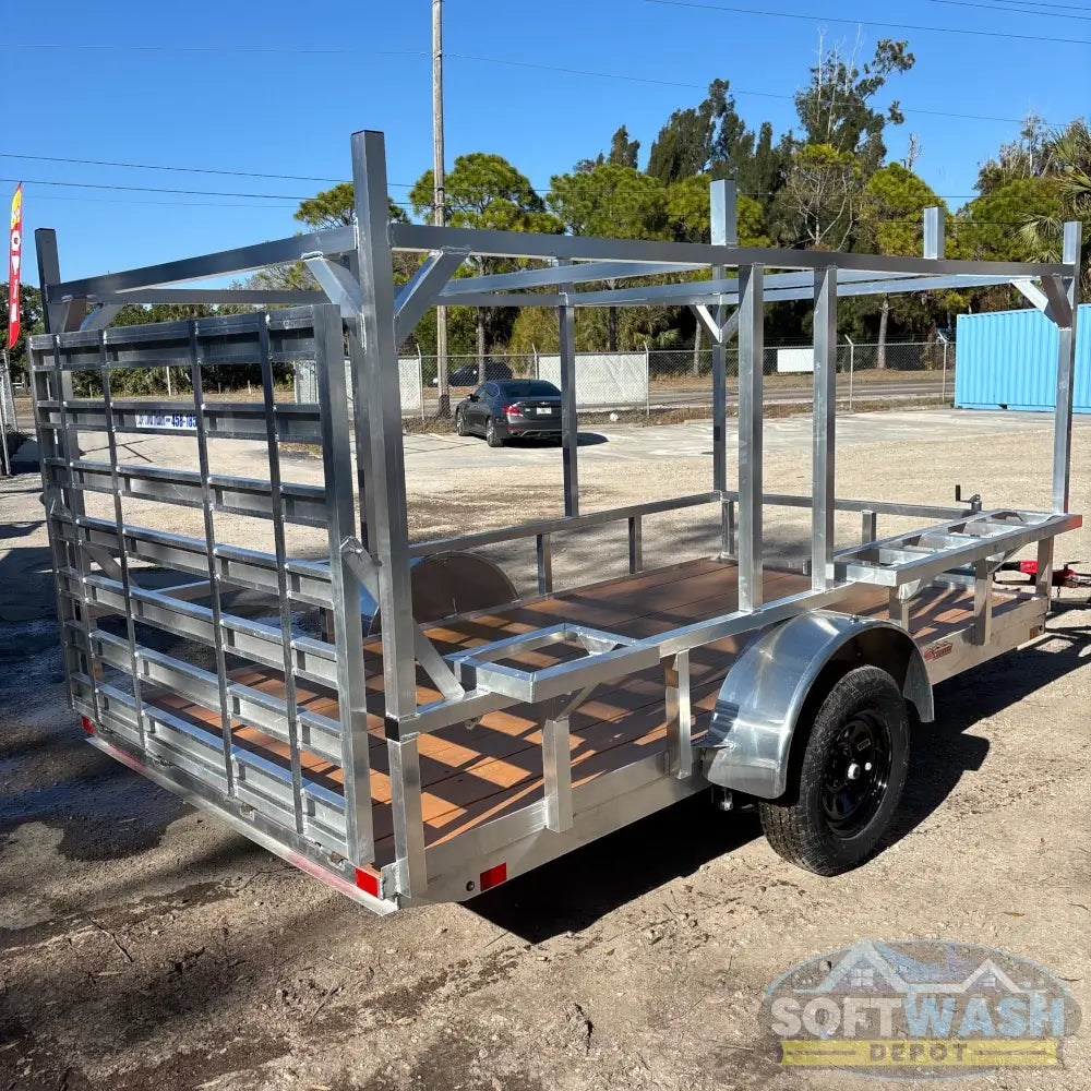 2026 Alcom 6x12 single axle aluminum trailer with rear drop-down tailgate and pressure-treated wood floor, designed for contractor and soft wash equipment setups. - Soft Wash Depot