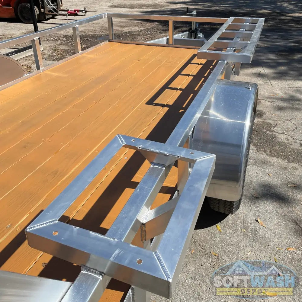 2026 Alcom 6x12 single axle aluminum trailer with rear drop-down tailgate and pressure-treated wood floor, designed for contractor and soft wash equipment setups. - Soft Wash Depot