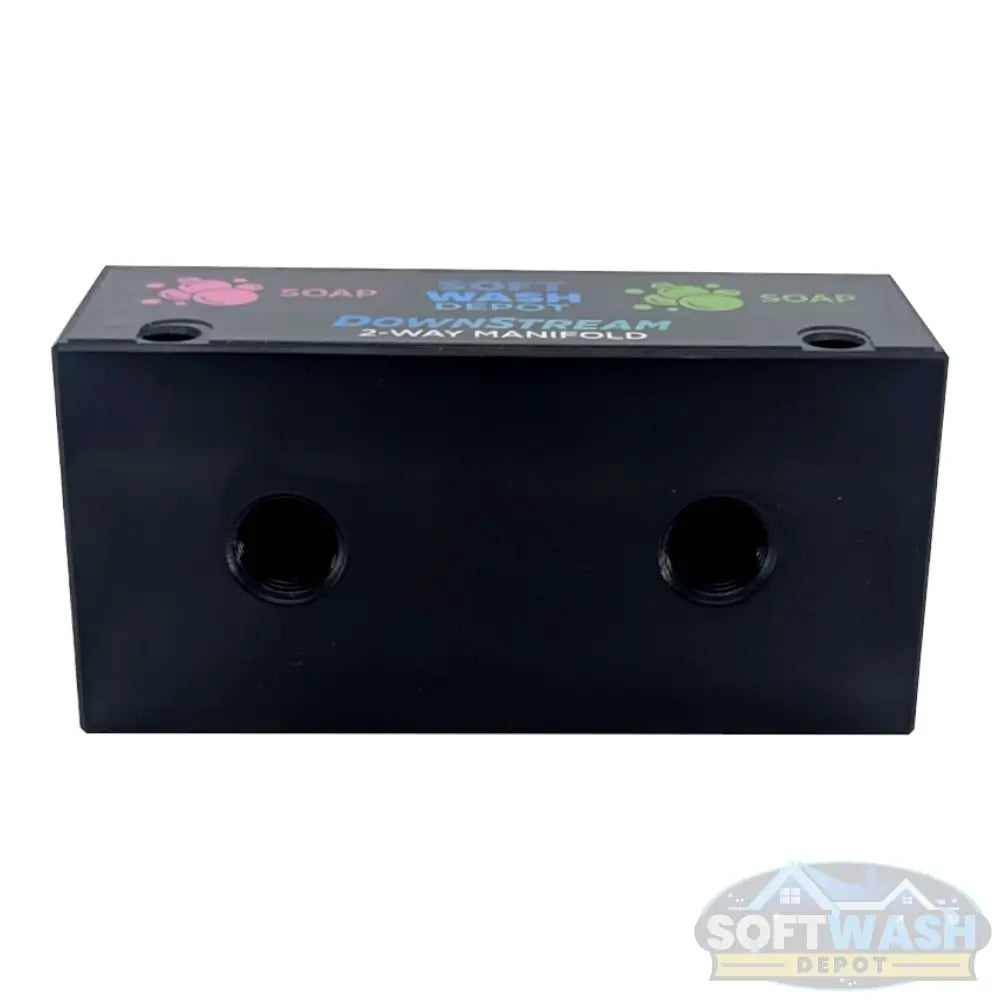 Black downstream injector manifold block available in 2-port and 3-port configurations, featuring chemical-resistant valves and barbed fittings for quick soft wash solution switching. - Soft Wash Depot
