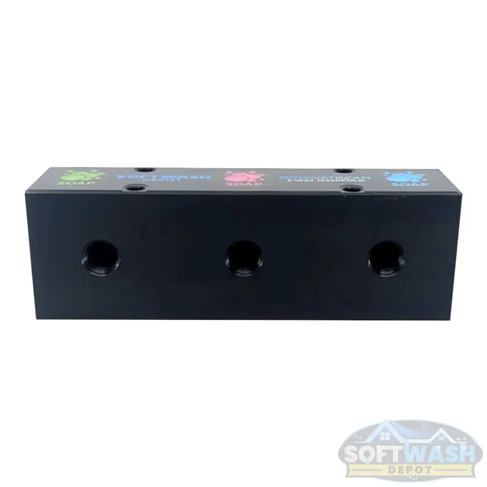 Black downstream injector manifold block available in 2-port and 3-port configurations, featuring chemical-resistant valves and barbed fittings for quick soft wash solution switching. - Soft Wash Depot