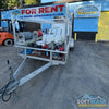 6' x 12' Aluminum Trailer Rental with 8 GPM Gas Soft Wash System - Fully equipped mobile pressure washing trailer with water tank, hose reels, and Honda engine - Available for rent from Soft Wash Depot.