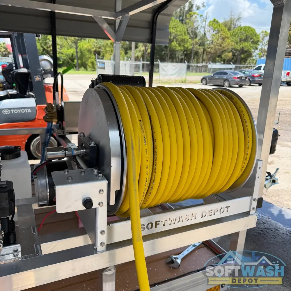 SWD electric hose reel with aluminum frame, stainless steel manifold and swivel, built for pressure washing and soft washing hose management. - Soft Wash Depot