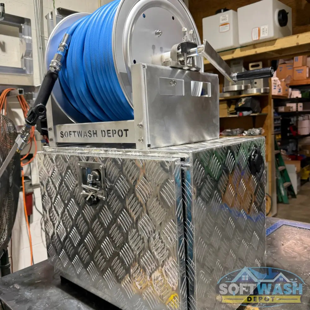 SWD Plug & Play 12V Soft Wash System with aluminum toolbox, stainless hose reel, blue soft wash hose, spray gun, EZ Blend proportioner, pump, valves, and fittings. - Soft Wash Depot
